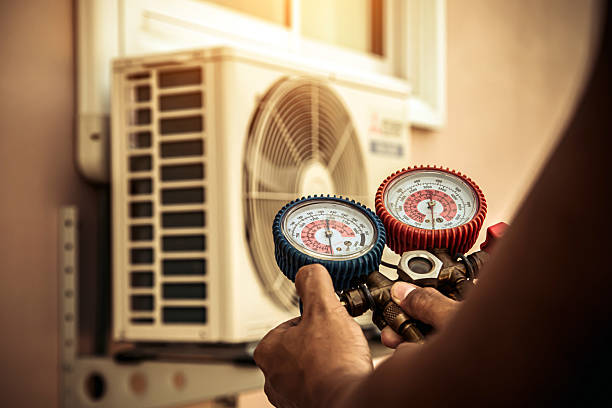 Professional Emergency Hvac technician working in College Corner, OH